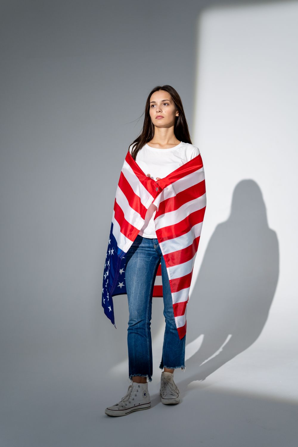 Woman wrapped in an American flag