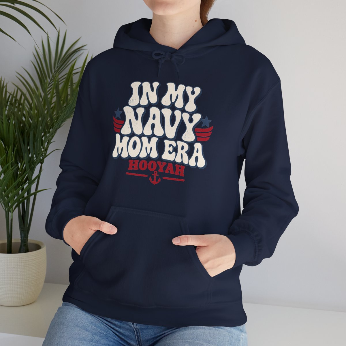 An In My Navy Mom Era hoodie worn casually