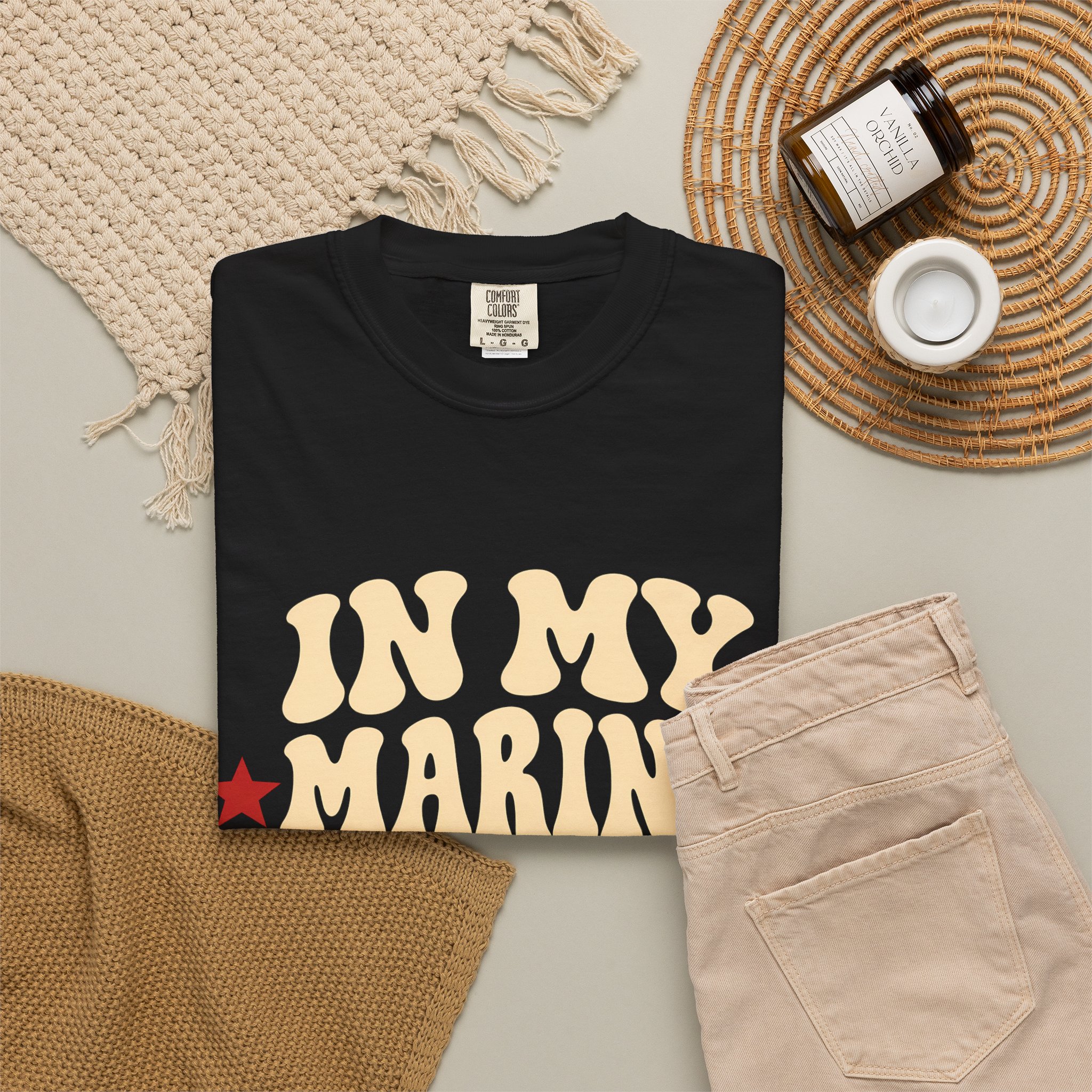 In My Marine Sister Era Comfort Colors Tee in Black, folded