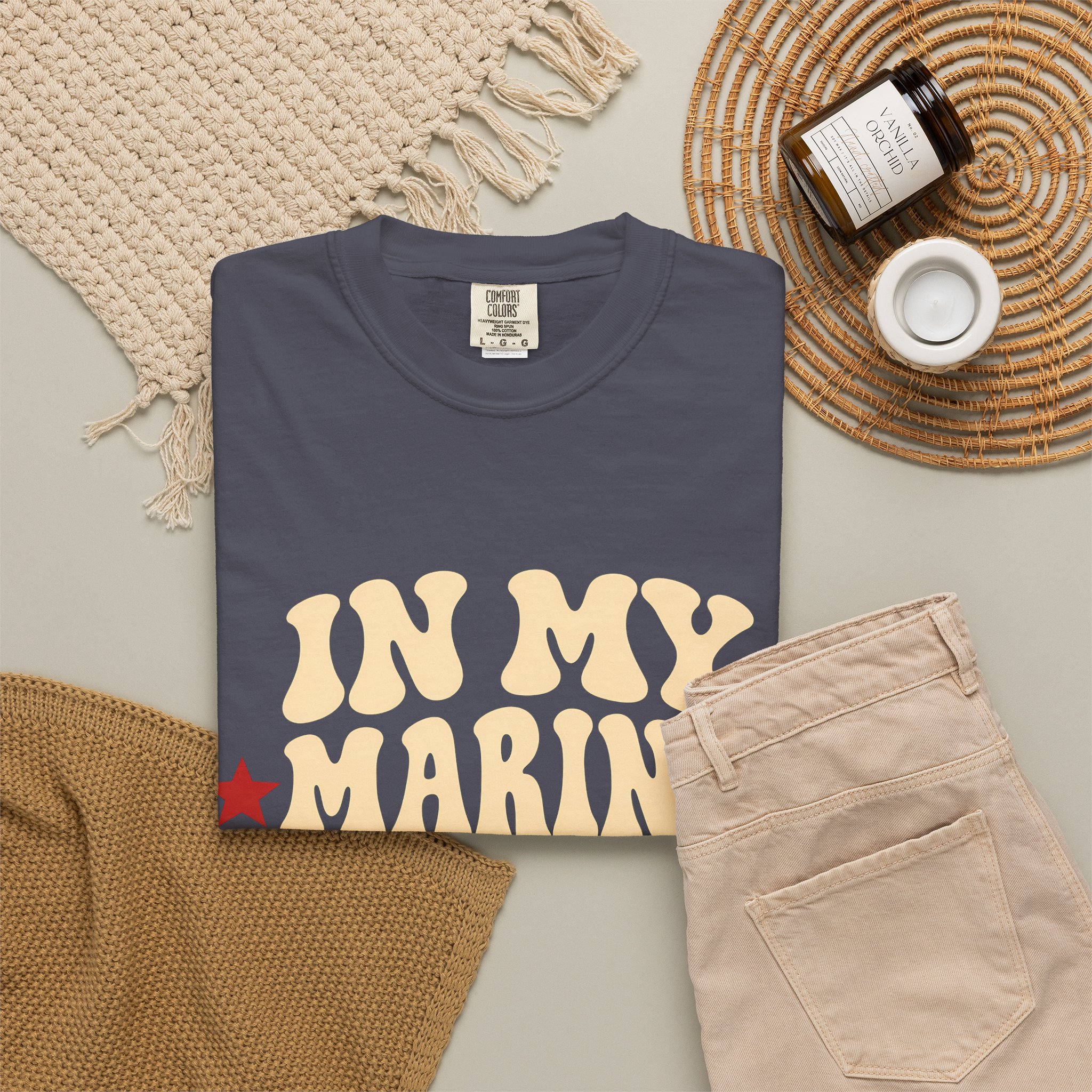 In My Marine Sister Era Comfort Colors Tee in Navy, folded
