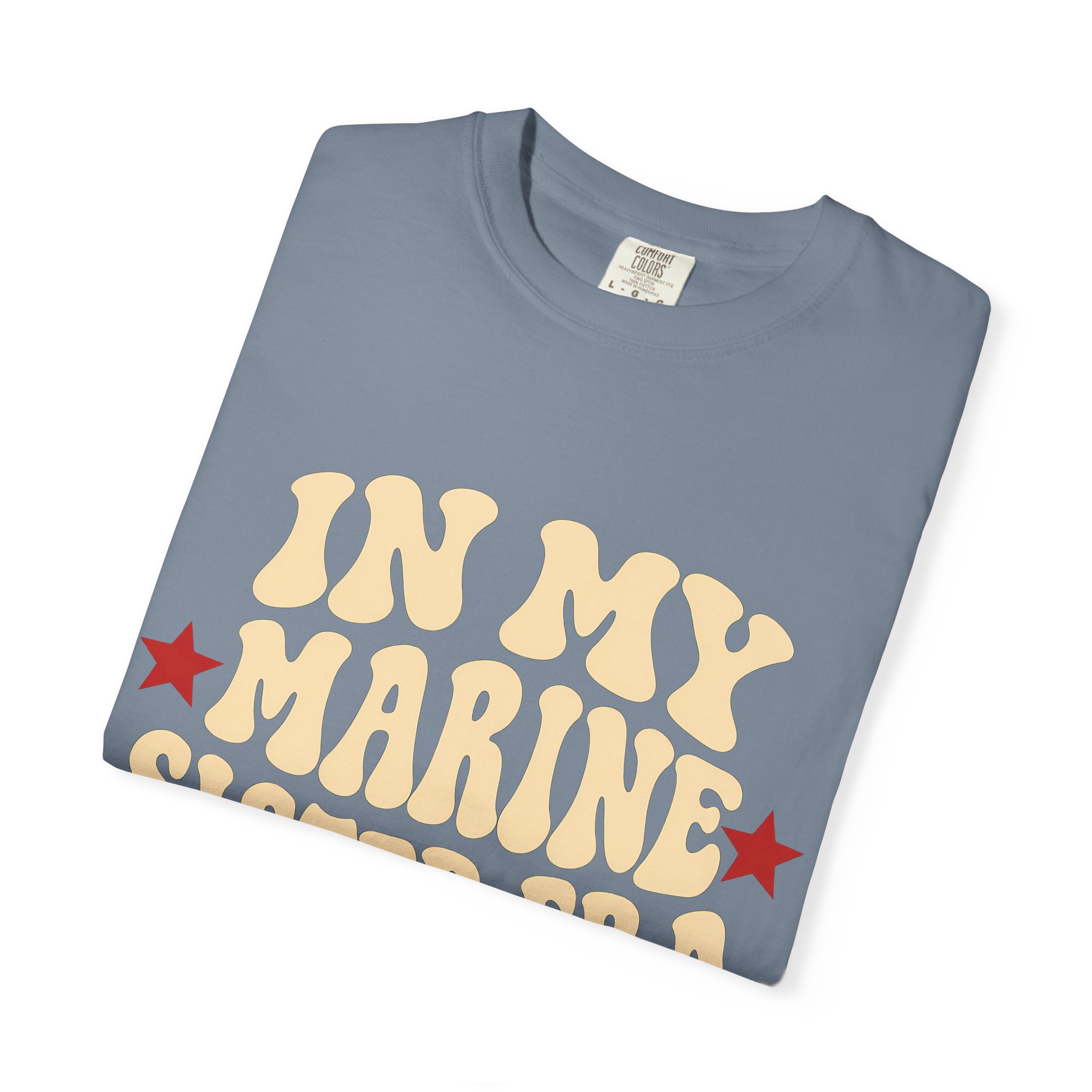 In My Marine Sister Era Comfort Colors Tee in Blue Jean, folded