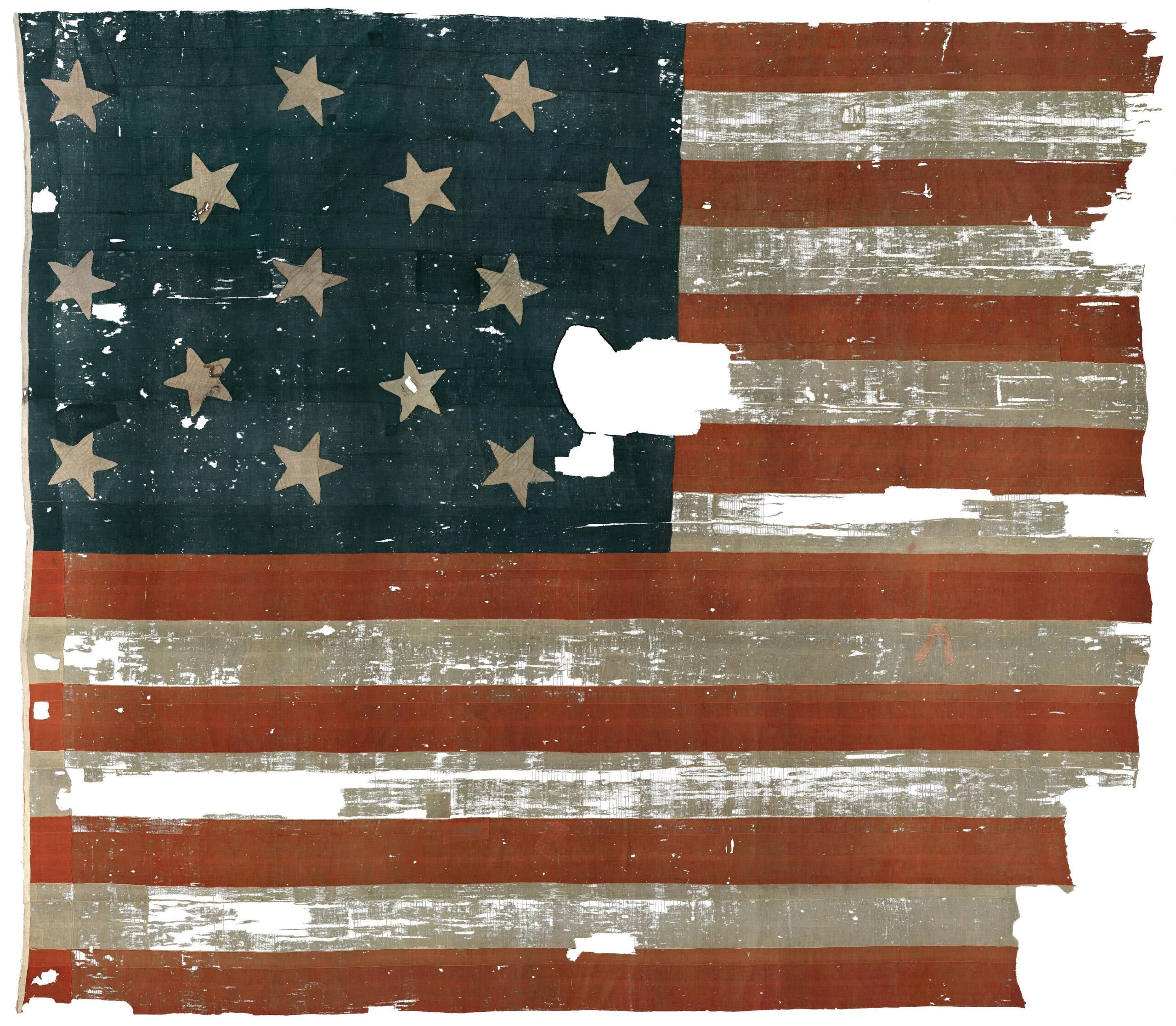 The surviving Star Spangled Banner flag from Fort McHenry, torn and faded